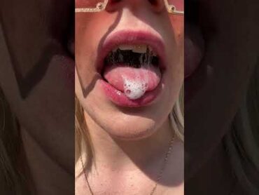 A nice girl shows mouth throat uvula and tongue