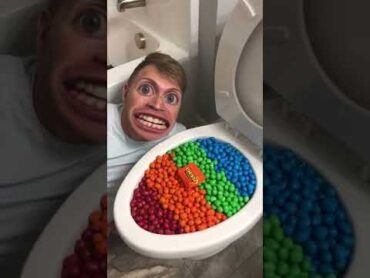 Eating Colorful Chocolate M&M&39;s Candy in Toilet shorts