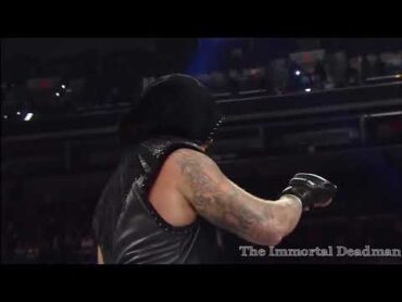 UNDERTAKER AND KANE PAY RESPECT TO PAUL BEARER.